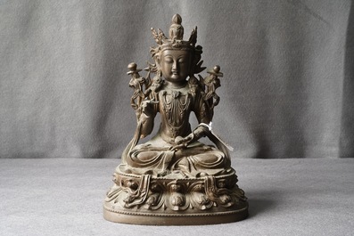 A Chinese bronze figure of Guanyin, Ming