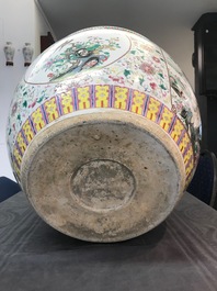 A large Chinese famille rose fish bowl with birds among flowers, 19th C.