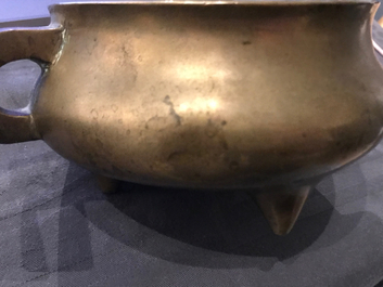 A Chinese bronze tripod censer, Qianlong mark, 19th C.