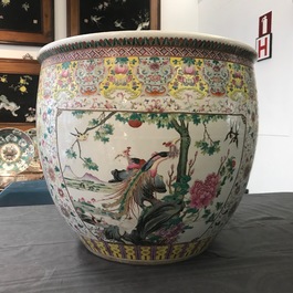 A large Chinese famille rose fish bowl with birds among flowers, 19th C.