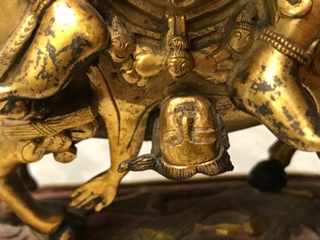 A Tibetan gilt bronze figure of Palden Lhamo, 17th C.