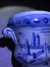 A pair of small Dutch Delft blue and white 'campana' vases on stands, 18th C.