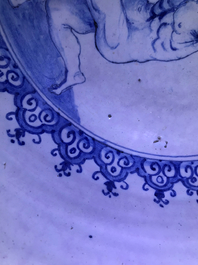 A fine and large Dutch Delft blue and white 'maritime subject' bowl depicting Atlas, 18th C.