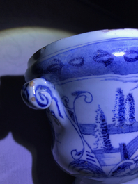 A pair of small Dutch Delft blue and white 'campana' vases on stands, 18th C.