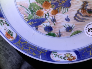 A pair of Chinese famille verte 'ducks in a lotus pond' plates, Kangxi