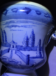 A pair of small Dutch Delft blue and white 'campana' vases on stands, 18th C.