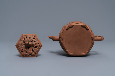 A Chinese Yixing stoneware reticulated teapot and cover, Kangxi
