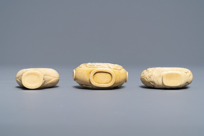 Three Chinese carved ivory snuff bottles, 19th C.