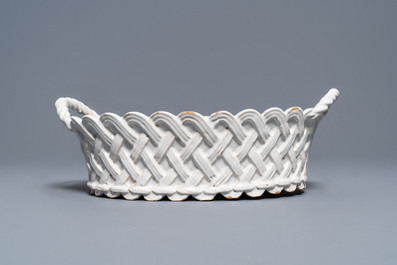 An oval monochrome white Brussels faience basket, 18th C.