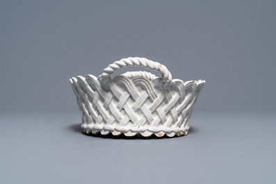 An oval monochrome white Brussels faience basket, 18th C.