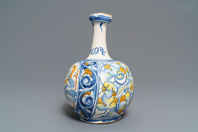 An Italian maiolica pharmacy bottle with a male portrait, Deruta or Castelli, 17th C.