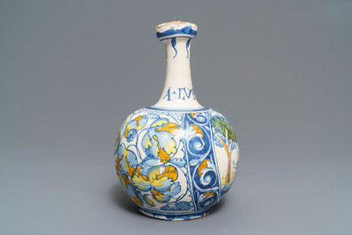 An Italian maiolica pharmacy bottle with a male portrait, Deruta or Castelli, 17th C.