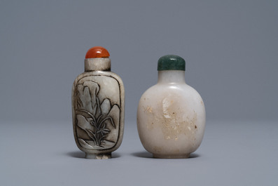 Three Chinese greyish white and black and white jade snuff bottles, 19/20th C.