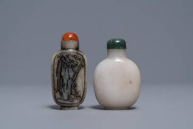 Three Chinese greyish white and black and white jade snuff bottles, 19/20th C.