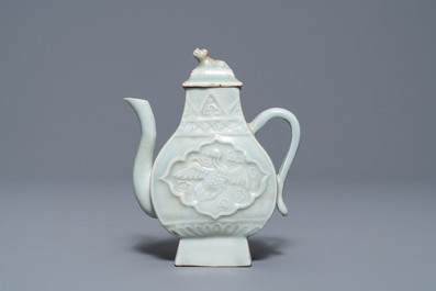 A Chinese qingbai relief-decorated 'phoenix' ewer and cover, Yuan