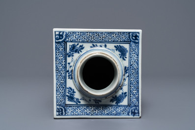 A large square Chinese blue and white tea caddy with floral design, Kangxi