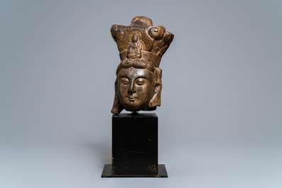 A Chinese carved stone head of a Bodhisattva, prob. Ming