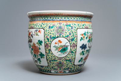 A Chinese famille verte fish bowl with birds among flowers, 19th C.