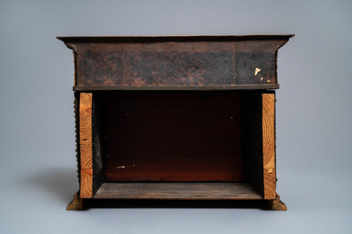 A turquoise-inlaid gilt bronze and copper repouss&eacute; 'tepchog' folding altar table, Tibet, 19th C.