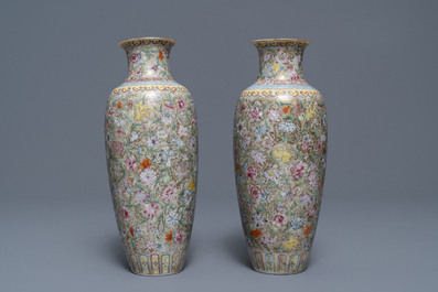 A pair of Chinese famille rose 'millefleurs' eggshell vases, Qianlong mark, Republic, 20th C.