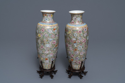 A pair of Chinese famille rose 'millefleurs' eggshell vases, Qianlong mark, Republic, 20th C.