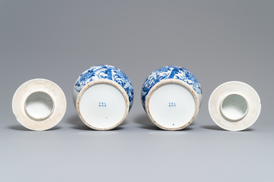 Two pairs of Chinese blue and white vases and covers, Kangxi and Chenghua marks, 19th C.