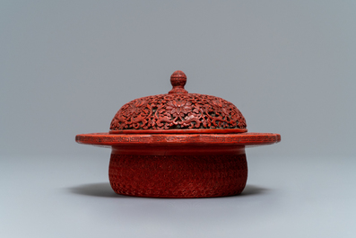 A Chinese cinnabar lacquer box and cover with floral design, 18/19th C.