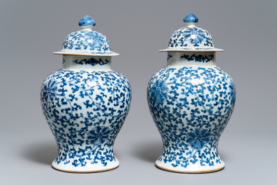 Two pairs of Chinese blue and white vases and covers, Kangxi and Chenghua marks, 19th C.