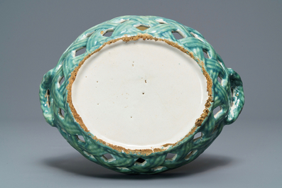 A polychrome Brussels faience 'landscape' basket, 18th C.