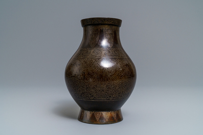 A Chinese inlaid bronze 'hu' vase, 19th C.