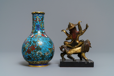 A Chinese cloisonn&eacute; bottle vase and a gilt bronze group, 18/19th C.