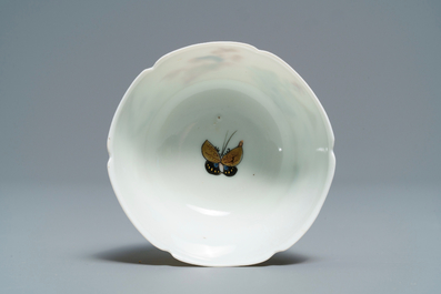 A Chinese grisaille and gilt eggshell cup and saucer, Yongzheng