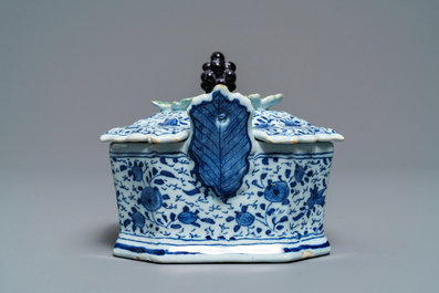 A Dutch Delft blue and white grape-topped butter tub, 18th C.