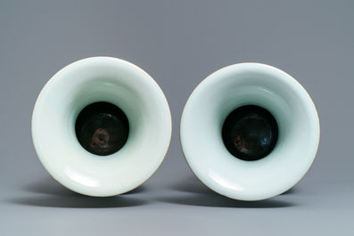 A pair of Chinese famille rose 'Magu' vases, 19/20th C.