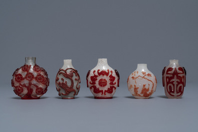 Ten Chinese red overlay, snowflake and transparent glass snuff bottles, 18/20th C.