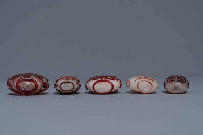 Ten Chinese red overlay, snowflake and transparent glass snuff bottles, 18/20th C.