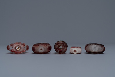 Ten Chinese red overlay, snowflake and transparent glass snuff bottles, 18/20th C.