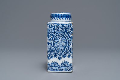 A Dutch Delft blue and white tea caddy with screw cap, late 17th C.