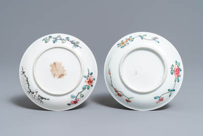 A pair of Chinese famille rose cups and saucers, Yongzheng