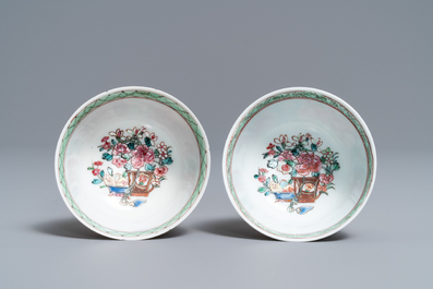 A pair of Chinese famille rose cups and saucers, Yongzheng