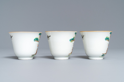 Three Chinese famille verte 'deer and monkey' cups and saucers, Tongzhi mark and of the period