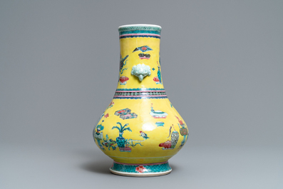 A Chinese yellow-ground famille rose bottle vase with antiquities design, Yongzheng