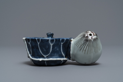 A Chinese underglaze blue and copper-red 'crab and lotus' water dropper, Kangxi