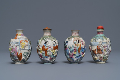 Four Chinese famille rose porcelain relief-decorated snuff bottles, 19th C.