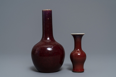 Two Chinese monochrome sang-de-boeuf and flamb&eacute; vases, 19th C.