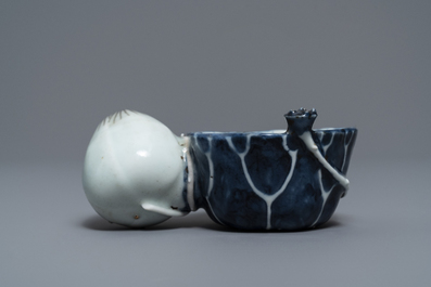 A Chinese underglaze blue and copper-red 'crab and lotus' water dropper, Kangxi