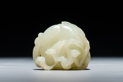 A Chinese celadon jade carving of two monkeys on a peach, 19th C.