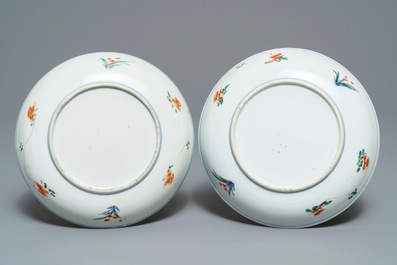 A pair of Chinese famille verte 'ducks in a lotus pond' plates, Kangxi