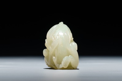 A Chinese celadon jade carving of two monkeys on a peach, 19th C.