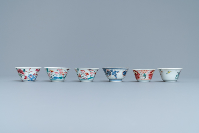 Six Chinese famille rose and Imari-style cups and saucers, Yongzheng/Qianlong